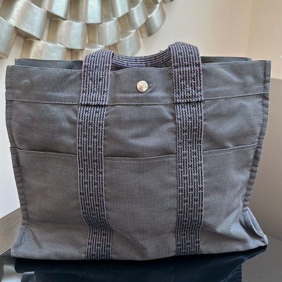 Hermes Handbags - Hermès Canvas Tote Bag with Top Zip Closure *FLAWS noted*